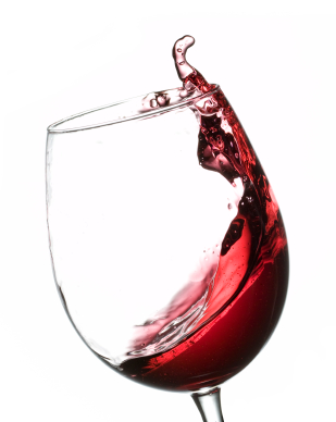 glass of red wine sloshing