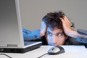 Blonde woman holding jaw